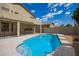 Enjoy this backyard swimming pool with a clear view of the house, perfect for relaxation and outdoor fun at 19520 N 65Th Ave, Glendale, AZ 85308