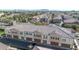 Aerial view of townhouses with garages and mountain views at 1959 E Hampton Ln # 102, Gilbert, AZ 85295