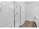 Clean bathroom with a walk-in shower and white tile at 1959 E Hampton Ln # 102, Gilbert, AZ 85295