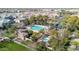 Aerial view showing community pool and surrounding landscape at 1959 E Hampton Ln # 102, Gilbert, AZ 85295