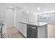 Kitchen with gray quartz countertops and stainless steel dishwasher at 1959 E Hampton Ln # 102, Gilbert, AZ 85295