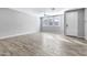 Bright living room with wood-look floors and ceiling fan at 1959 E Hampton Ln # 102, Gilbert, AZ 85295