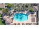 Community pool with surrounding patio space at 1959 E Hampton Ln # 102, Gilbert, AZ 85295