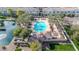 Community pool and adjacent clubhouse at 1959 E Hampton Ln # 102, Gilbert, AZ 85295