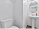 Clean powder room with pedestal sink and toilet at 1959 E Hampton Ln # 102, Gilbert, AZ 85295