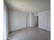 Bedroom with tile floors and access to patio at 209 E Loma Linda Blvd # 1, Avondale, AZ 85323