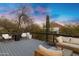 Spacious outdoor deck with plush seating, ideal for enjoying serene desert views at 2306 N 55Th St, Phoenix, AZ 85008