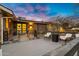 Backyard deck features desert landscaping, outdoor seating, and great mountain views at 2306 N 55Th St, Phoenix, AZ 85008