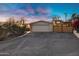 Classic home featuring a two car garage, a modern privacy fence, and mountain views at 2306 N 55Th St, Phoenix, AZ 85008