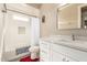 Bright bathroom features modern fixtures, a tub and shower with white subway tile at 2306 N Floyd Dr, Mesa, AZ 85215