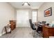 Office space with a desk, a rolling chair, and a closet for extra storage at 2306 N Floyd Dr, Mesa, AZ 85215