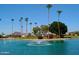 Pond with a fountain and desert landscaping in the Apache Wells community at 2306 N Floyd Dr, Mesa, AZ 85215