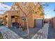 Landscaped backyard with a storage shed and raised garden beds at 2404 E Gillcrest Rd, Gilbert, AZ 85298