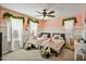 Bedroom with two twin beds, a desk, and playful decor at 2404 E Gillcrest Rd, Gilbert, AZ 85298