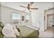 Bedroom with a cozy bed and an en-suite bathroom at 2404 E Gillcrest Rd, Gilbert, AZ 85298