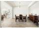 Formal dining room with hardwood floors and ample space for entertaining at 26921 N 100Th Ave, Peoria, AZ 85383