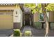 Inviting front entrance featuring a stone facade and a covered doorway at 26921 N 100Th Ave, Peoria, AZ 85383