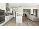 Stylish kitchen featuring white cabinets, granite countertops, and an open design at 26921 N 100Th Ave, Peoria, AZ 85383