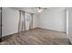 Simple bedroom with wood-look floors and ceiling fan at 2918 E Laurel Ln, Phoenix, AZ 85028