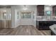 Dining area with wood-look floors and kitchen views at 2918 E Laurel Ln, Phoenix, AZ 85028