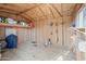 Organized storage shed with gardening tools and grill at 2918 E Laurel Ln, Phoenix, AZ 85028