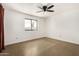 Bright bedroom with ceiling fan and concrete floors at 321 W Palo Verde St, Gilbert, AZ 85233