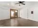 Spacious bedroom with wood door leading to patio at 321 W Palo Verde St, Gilbert, AZ 85233