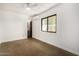 Spacious bedroom with ceiling fan and window at 321 W Palo Verde St, Gilbert, AZ 85233