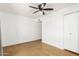 Simple bedroom with ceiling fan and closet at 321 W Palo Verde St, Gilbert, AZ 85233