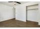 Bright bedroom with ceiling fan and concrete floors at 321 W Palo Verde St, Gilbert, AZ 85233