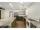 Modern kitchen with stainless steel appliances and green shaker cabinets at 321 W Palo Verde St, Gilbert, AZ 85233