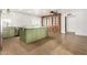 Modern kitchen with green cabinets and island at 321 W Palo Verde St, Gilbert, AZ 85233