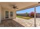 Covered patio with pavers and ceiling fan at 321 W Palo Verde St, Gilbert, AZ 85233