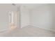 Bedroom featuring neutral carpet, sliding closet doors and access to hallway at 3218 N Lafayette Dr, Florence, AZ 85132
