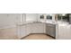 Kitchen island featuring granite countertops, stainless steel dishwasher, and white cabinets at 3218 N Lafayette Dr, Florence, AZ 85132