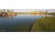 Scenic community lake with walking paths and green spaces at 3218 N Lafayette Dr, Florence, AZ 85132