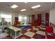 Bright playroom with toys, tables and colorful flooring at 3218 N Lafayette Dr, Florence, AZ 85132