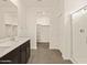 Elegant bathroom featuring double sinks, shower, and storage at 3353 E Alexander Dr, San Tan Valley, AZ 85143