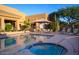 Community pool and hot tub with patio furniture at 34457 N Legend Trail N Pkwy # 2020, Scottsdale, AZ 85262