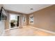 Open room featuring sliding glass doors leading to a balcony with mountain views at 37200 N Cave Creek Rd # 2127, Scottsdale, AZ 85262