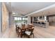 Spacious open-plan kitchen and dining area with an island and outside views at 37200 N Cave Creek Rd # 2127, Scottsdale, AZ 85262