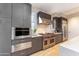 Well-equipped kitchen featuring stainless steel appliances, custom cabinetry, and a modern aesthetic at 37200 N Cave Creek Rd # 2127, Scottsdale, AZ 85262