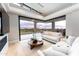 Inviting living room with floor-to-ceiling glass doors that lead to an outdoor patio and scenic views at 37200 N Cave Creek Rd # 2127, Scottsdale, AZ 85262