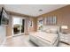 Comfortable bedroom suite with balcony access, picturesque views, and modern decor at 37200 N Cave Creek Rd # 2127, Scottsdale, AZ 85262