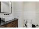 Powder room with pedestal sink and wood vanity at 5430 E Calle Redonda --, Phoenix, AZ 85018