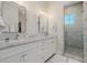 Double vanity bathroom with marble counters and a walk-in shower at 5430 E Calle Redonda --, Phoenix, AZ 85018