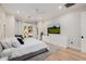 Bright bedroom with large TV and access to backyard at 5430 E Calle Redonda --, Phoenix, AZ 85018