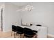 Modern dining room with sleek table and black velvet chairs at 5430 E Calle Redonda --, Phoenix, AZ 85018