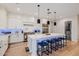 Modern kitchen features white cabinets, a large island, and stainless steel appliances at 5430 E Calle Redonda --, Phoenix, AZ 85018