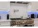 Stainless steel range, pot filler, and blue LED under cabinet lighting at 5430 E Calle Redonda --, Phoenix, AZ 85018